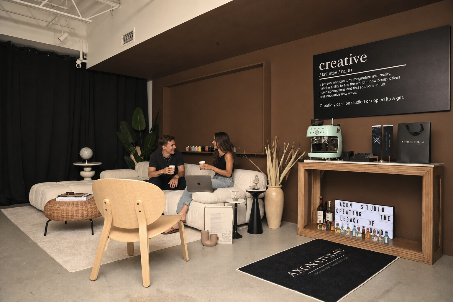 Creatives sharing coffee on the lounge sofa